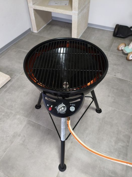 Churrasco a gás compacto Outdoorchef P-420G Minichef. 
É com