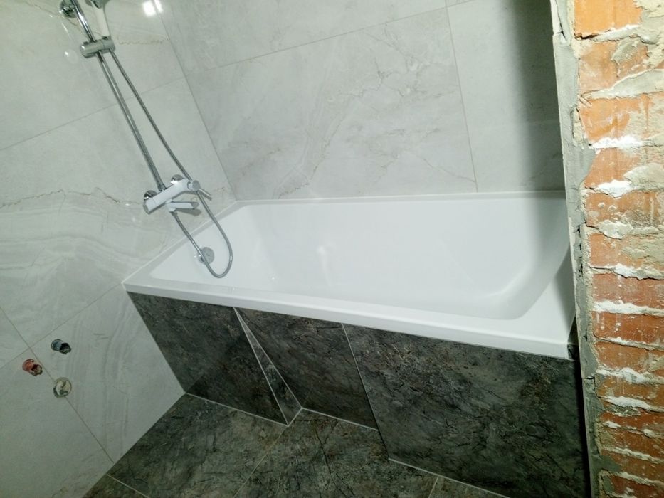 Укладання плитки, плиточник