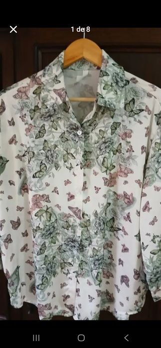 Blusa primavril estampada, tamanho L.