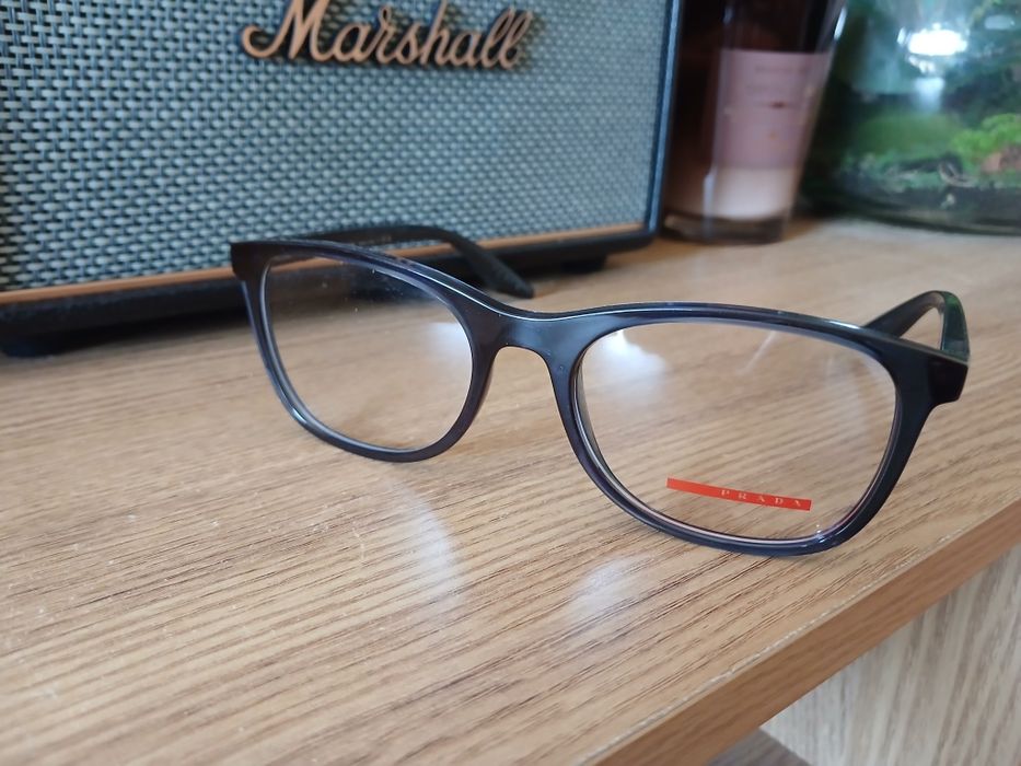 Armaçao oculos Prada