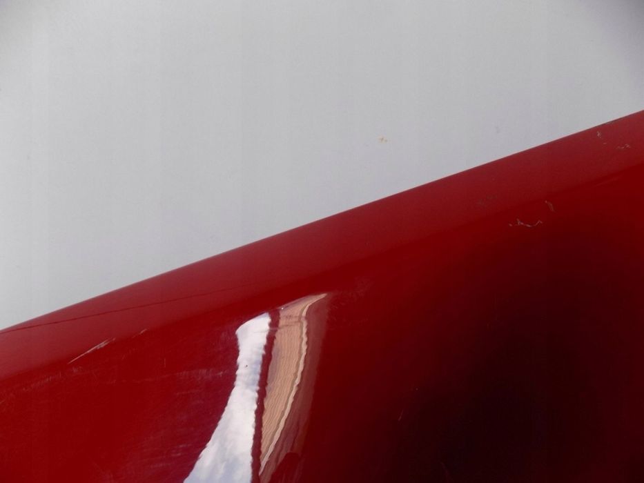 BMW 1 E87 E88 błotnik Lewy (A75 czerwony) - 0611