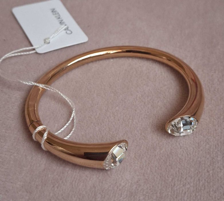 Calvin Klein Bransoletka z błyszczącymi kryształami różowo-złota XS