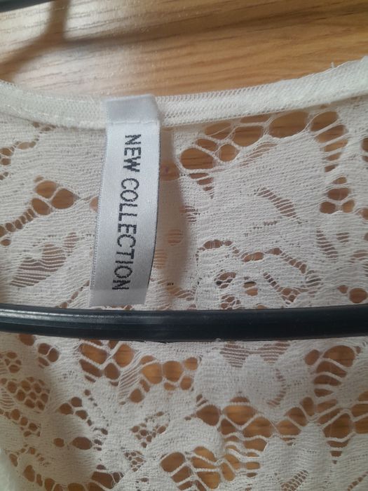 Biały koronkowy kombinezon