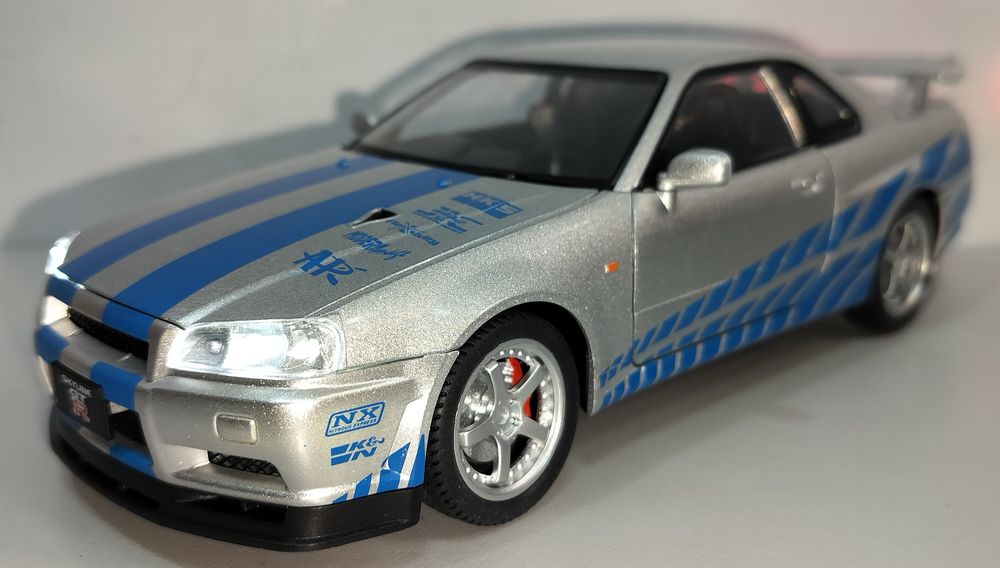Nissan Skyline GT-R R34 модель 1:24 Jinlifang Металл звук свет: 1