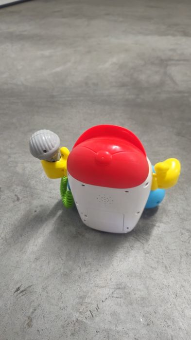 Brinquedo microfone e música