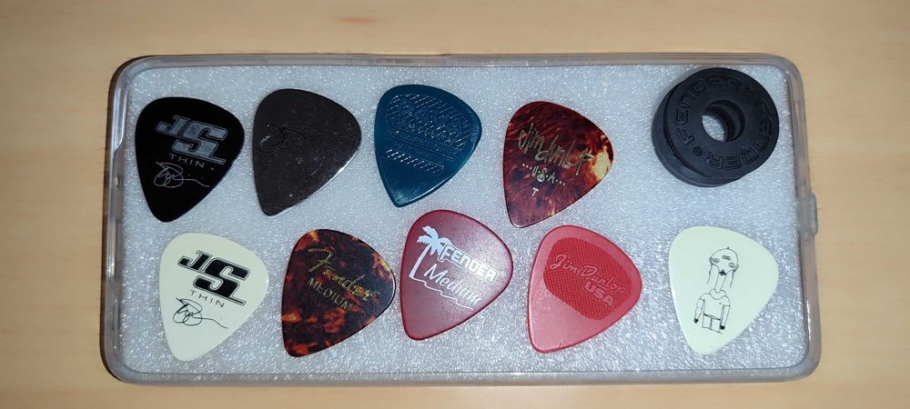 Acessórios para guitarra ou baixo - straps palhetas correias