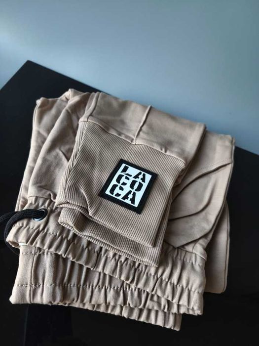 Wyprzedaż Spodnie dresowe nowe dres bawełna beż Elite Lacoca L/XL