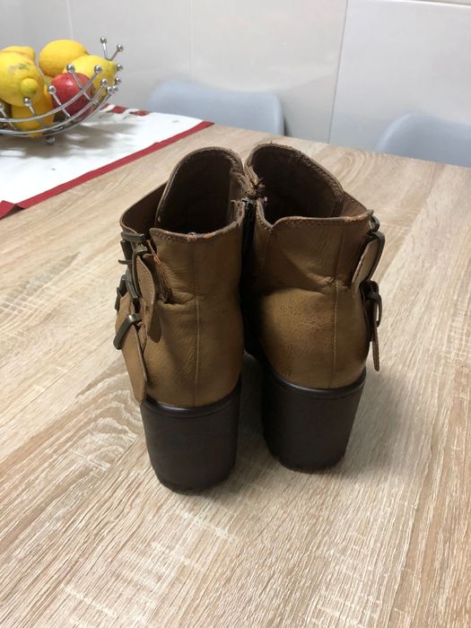 Botas de pele de cano baixo