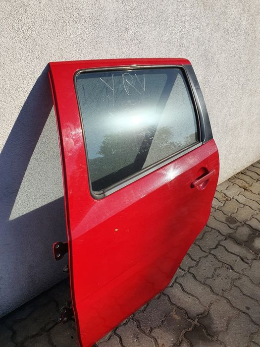 Daihatsu YRV M2 drzwi lewy tył tylne lewe kompletne