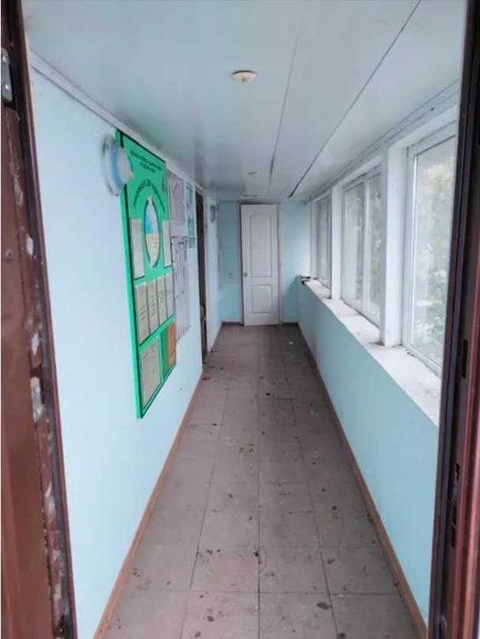 Нежитлова будівля 100,7 кв.м. (гараж Б,В, вбиральня Г, споруди №1-5)