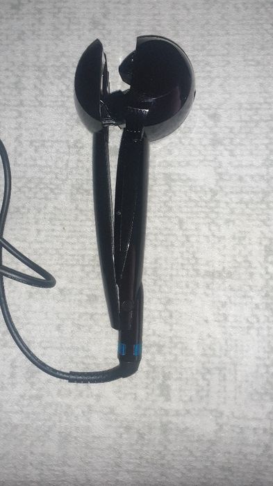 Modelador de cabelo automático