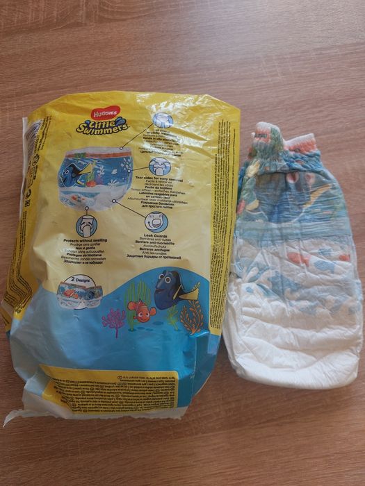 Продам памперси купальные трусики 5-6