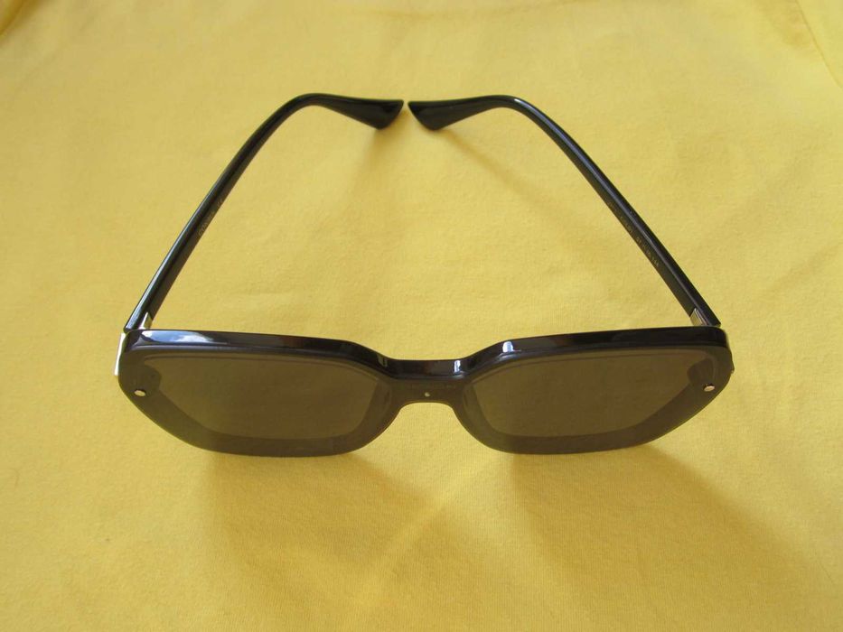 Очки солнцезащитные Consul Polaroid.