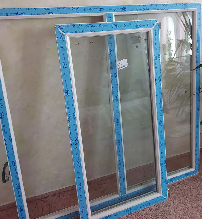 Металопластиковое окно с энергосберегающим стеклопакетом .подоконником