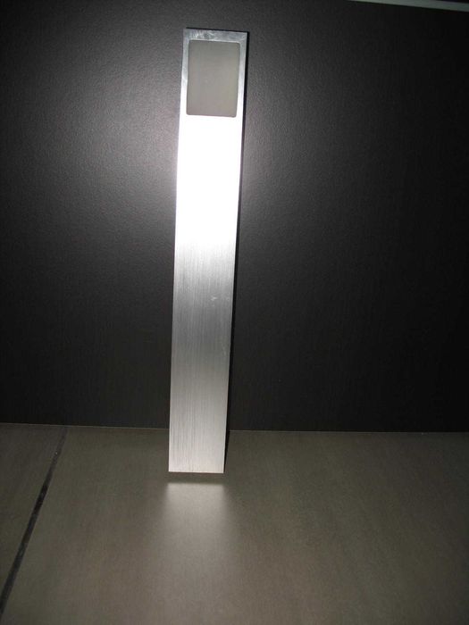 Iluminação em inox e vidro fosco