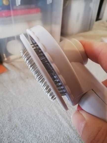 Escova auto-limpeza para animais de estimação