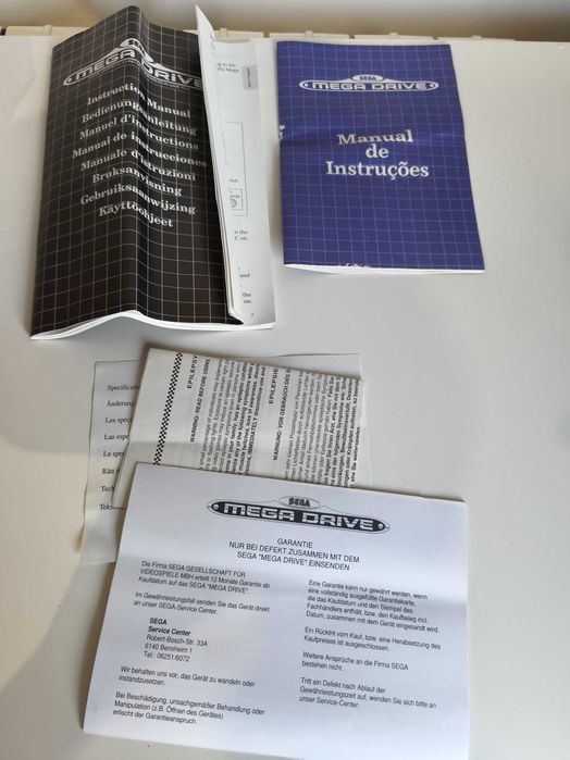 Sega Mega Drive com caixa e jogos