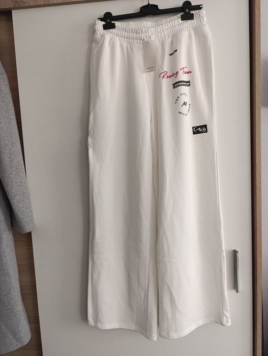 Reserved rozmiar 40 L białe spodnie dresowe z szerokimi nogawkami