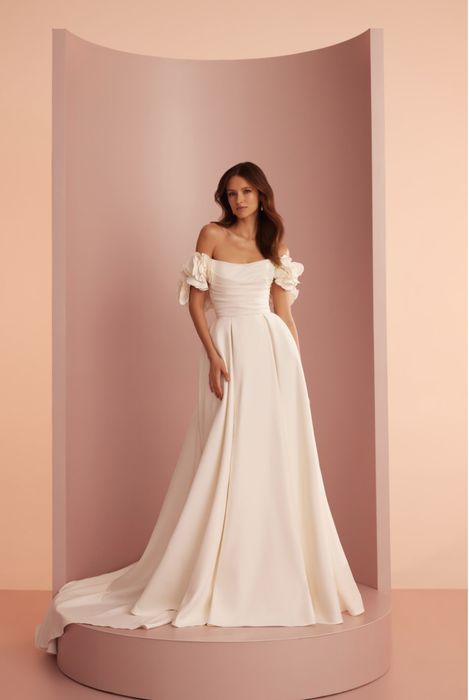 Весільна сукня з відкритими плечима