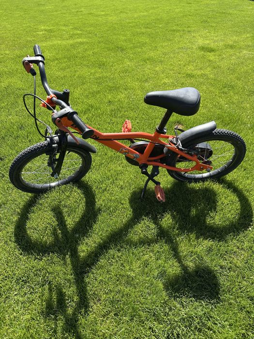 Rower b-twin 16 cali pomarańczowy