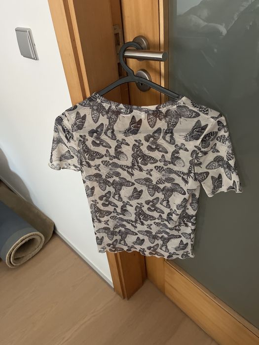 T shirt transparente com estampagem de borboletas