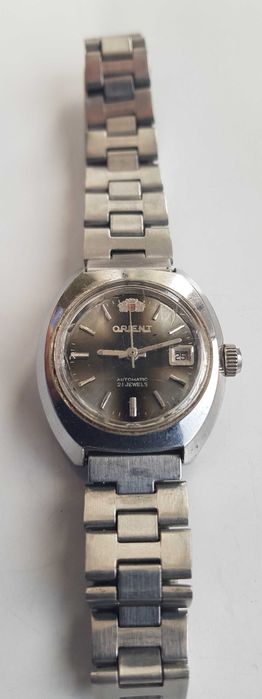 Zegarek nareczny Orient Automatic 21 Jewels V497-71906PR datownik bransoleta maly zgrabny meski damski unisex sr 25mm