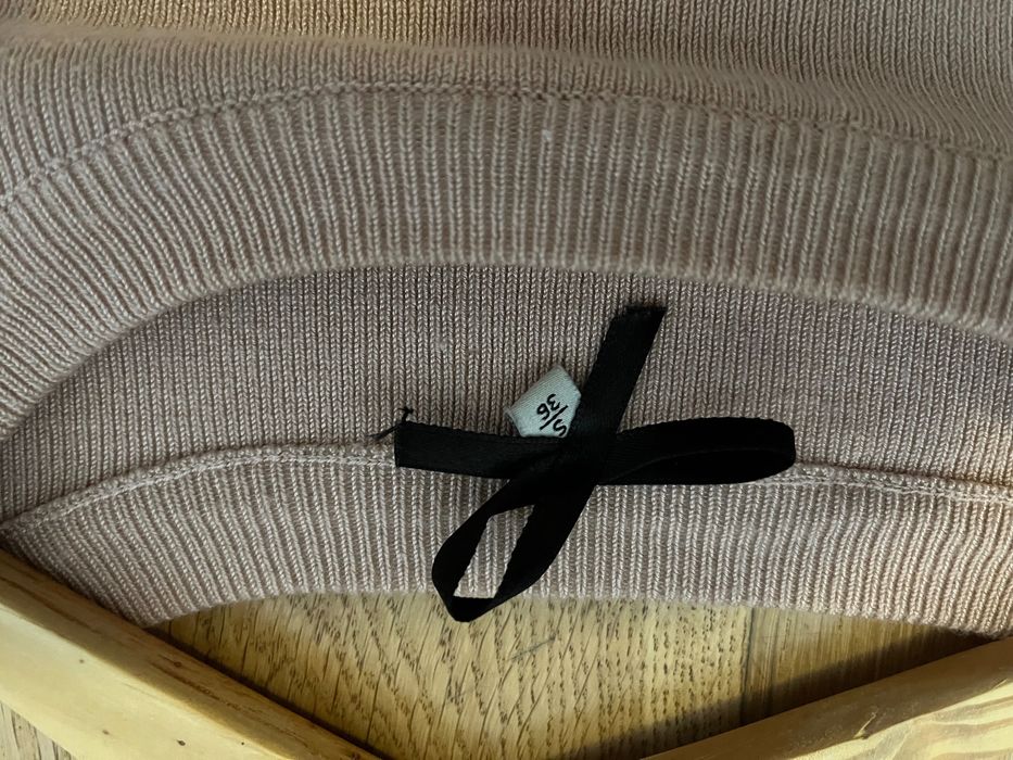 camisola de cor rosa. manga balão