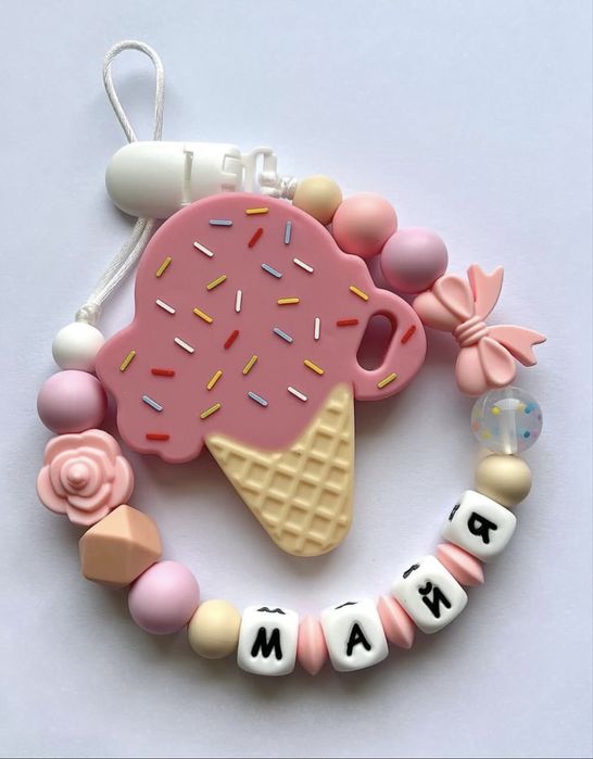 Тримач + гризунець для Вашого немовлятка