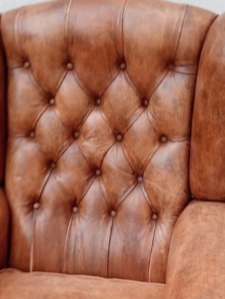 Sofá de orelhas em pele