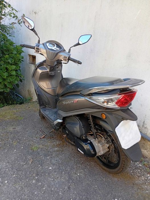 Moto 125 bem estimada troco por carro Ismart do mesmo valor..