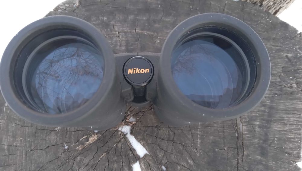 Продам бинокль 10х42-12х50