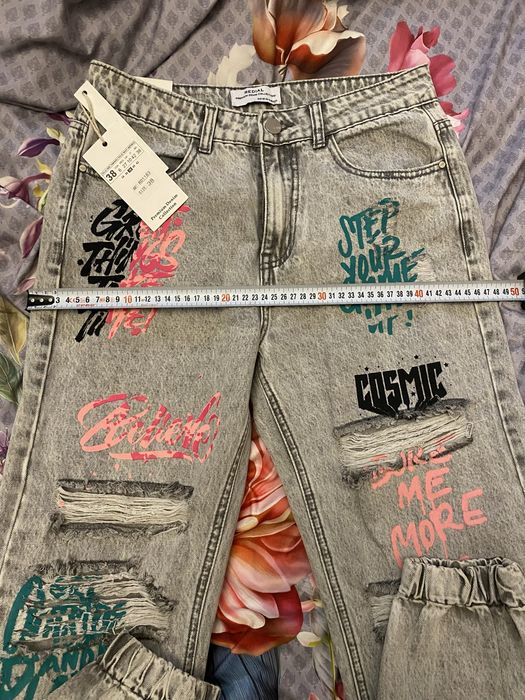 Super spodnie jeans przetarcia Nowe Graffiti rozmiar 38