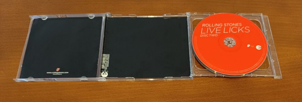 CD de Rolling Stones e SuperHeavy como Novos.