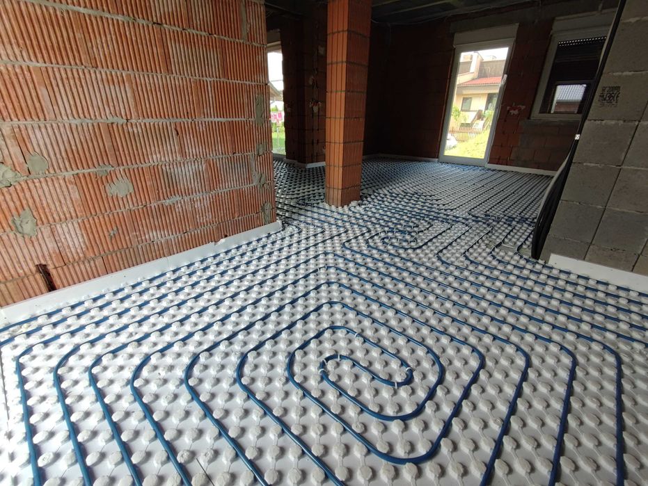 Posadzki betonowe Wylewki maszynowe Instalacje Podłogówka