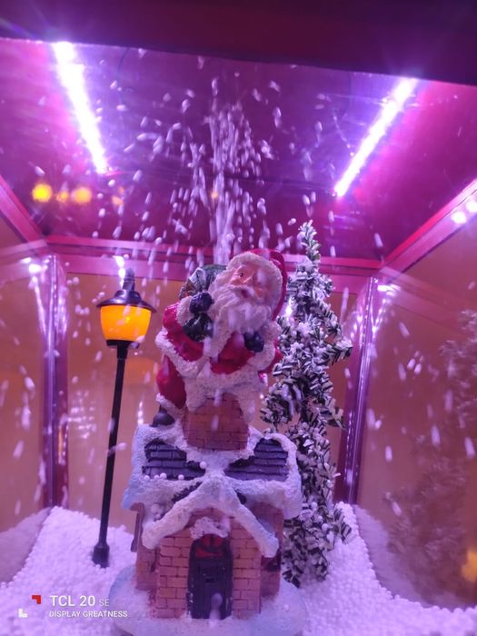 Candeeiro de Natal com luz e movimento de tempestade de neve