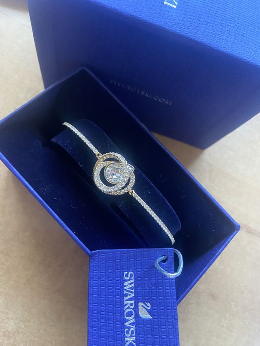 Bransoletka typu bangle w odcieniu złota NOWA Swarovski