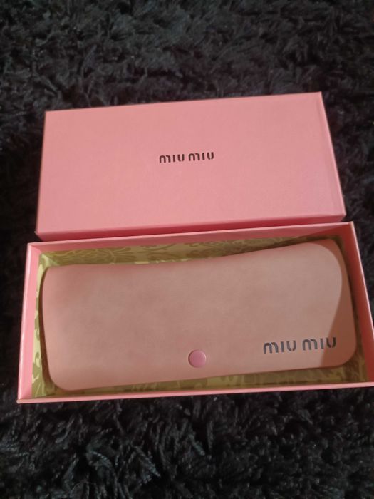 Óculos de Sol MiuMiu