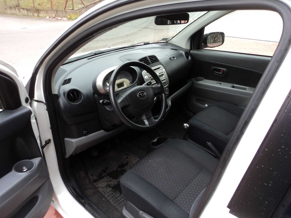 SUBARU JUSTY-DAIHATSU SIRION poj.998cm sam. osob.z LPG 2010 ROK.