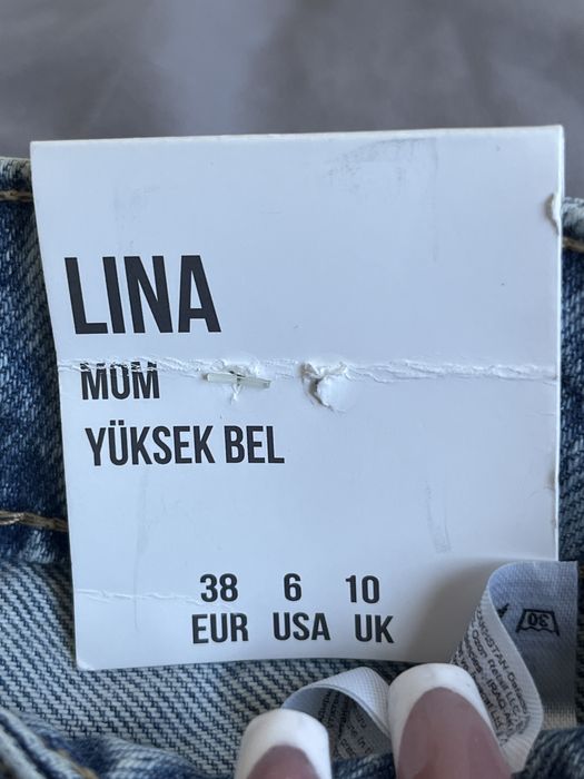 Джинси Mom, Рвані джинси