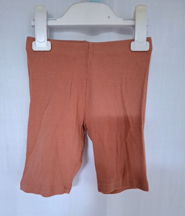 H&M ceglaste prążkowane kolarki legginsy r. 116