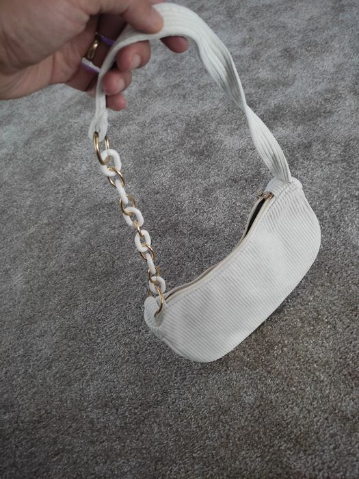 Pochete mala pequena branca e dourada