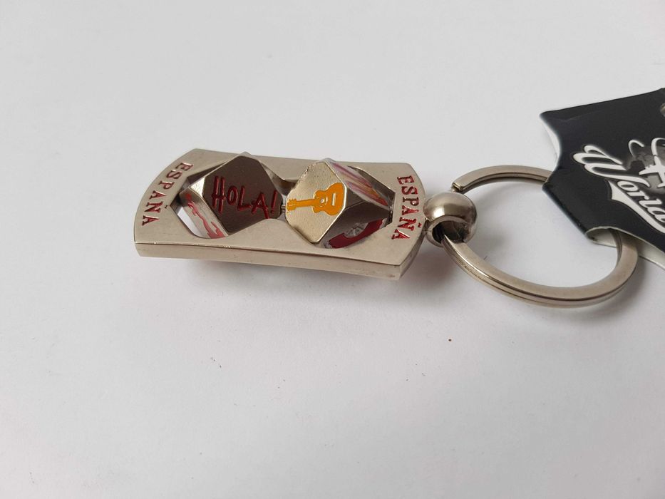 Красивий брелок з поворотними вставками, кубиками, espana
