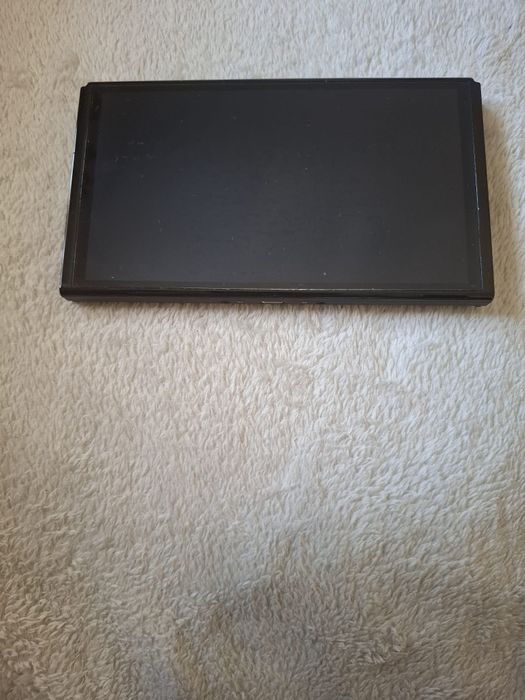 Nintendo Switch Oled (c/ pouco uso)