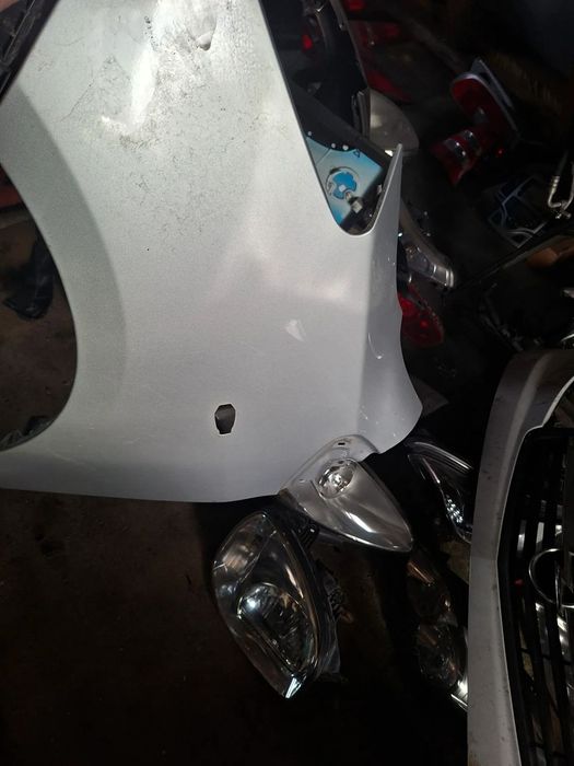 lewy błotnik yaris II 1E7 srebrny poznan