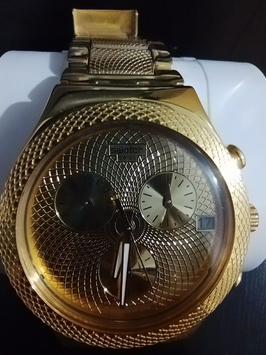 Relógio Swatch dourado