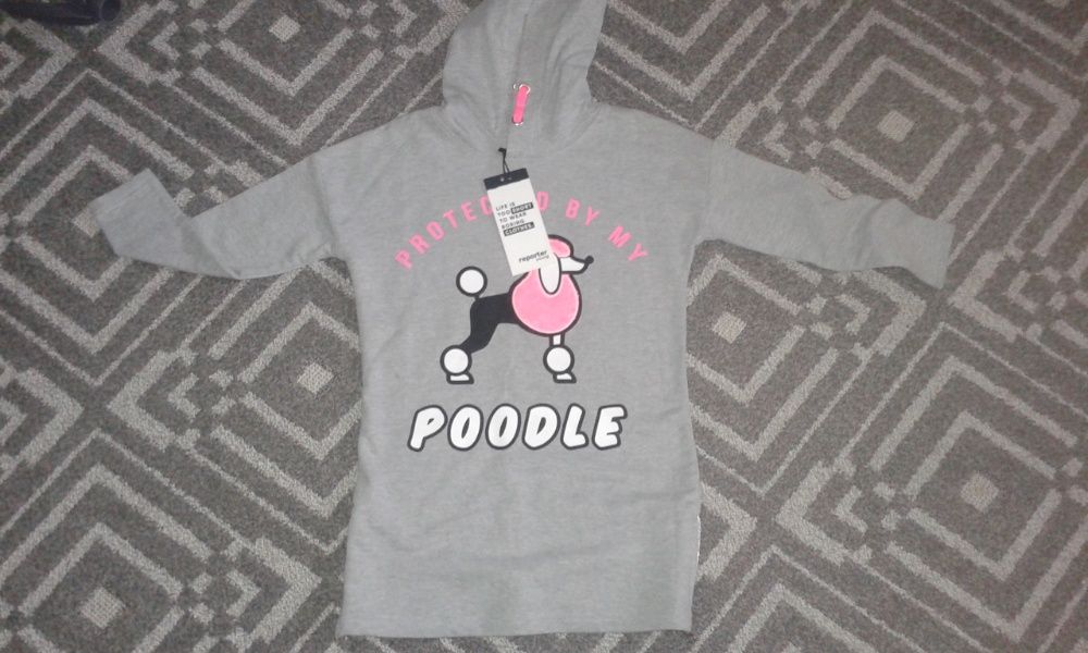 Bluza Reportet roz. 134 Nowa