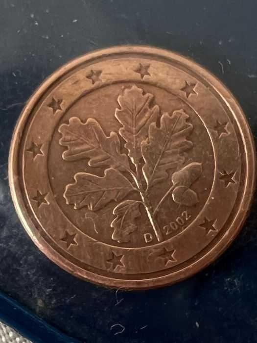 moedas u.s.a e Alemanha e da Finlândia com defeito