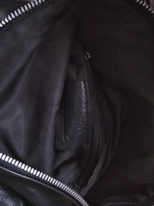 Używana skórzana listonoszka marki Venezia