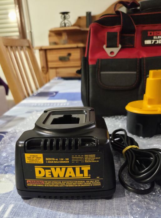 DeWalt Hammer drill DC 925 with charger, battery, and handheld stick