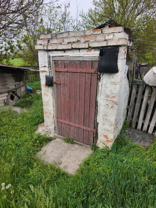 Продам приватизовоний будинок з приватизованою землею 45 соток.